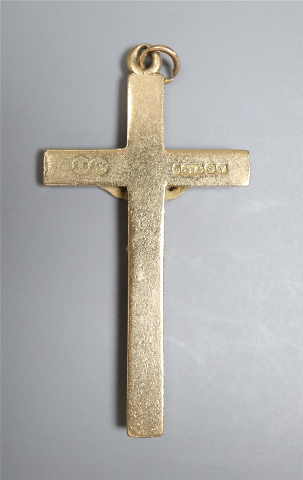 A 9ct gold crucifix pendant, 41mm, 4 grams.
